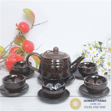 am-chen-uong-tra-qua-tang-gom-su-tinh-te