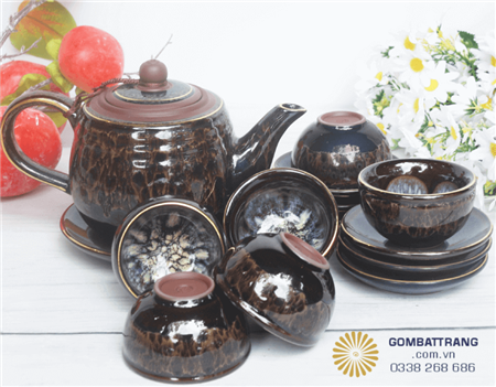am-chen-uong-tra-qua-tang-gom-su-tinh-te 2