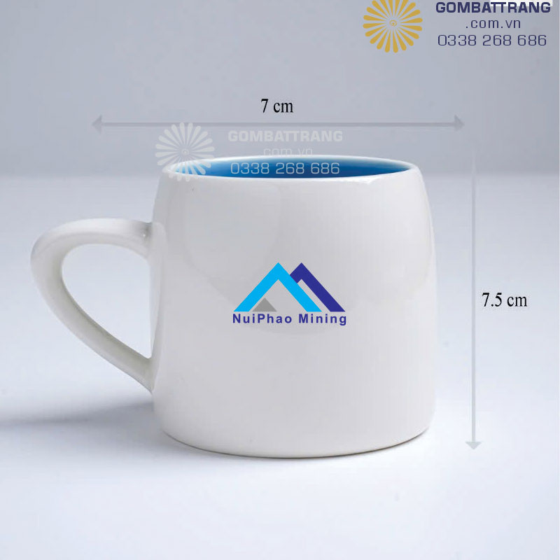 Ly sứ men trắng bên trong men xanh, thiết kế đẹp,sứ sạch an toàn, men bóng mịn, in logo lên ly sứ đẹp, sắc nét